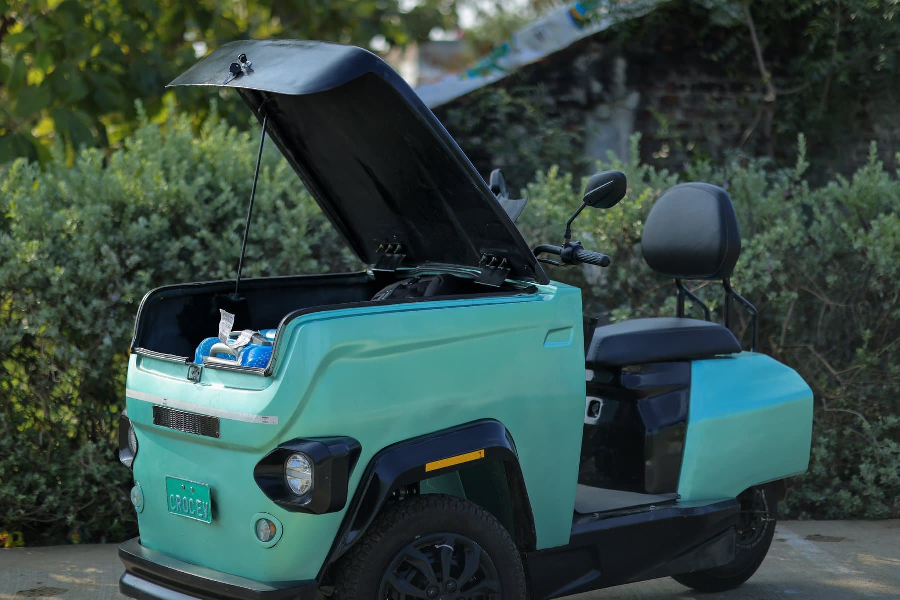 The CROC EV cargo box with its lid raised